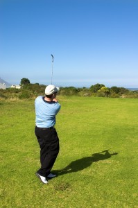 Golfer Strengthening the obliques will improve any golfer's swing.